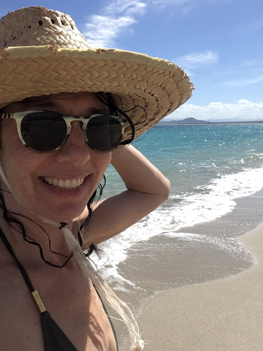 Solo Female Travel On the Beach - Small World Goods