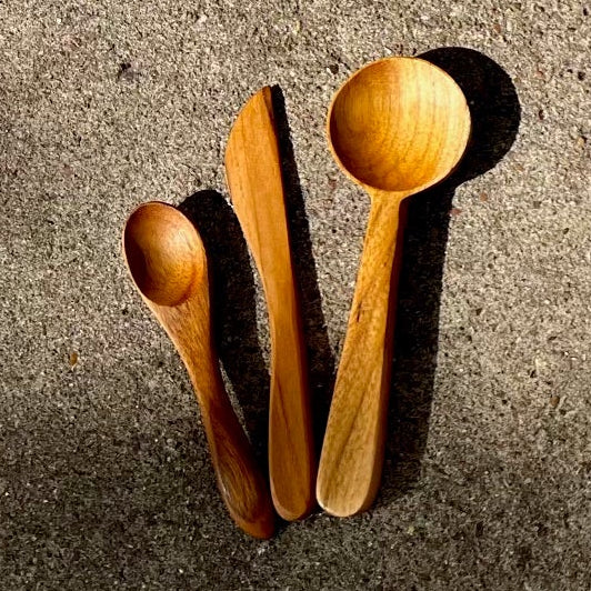 A set of handcrafted wooden serving utensils
